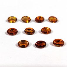 Madeira citrine 6x4mm oval facet  0.50 cts